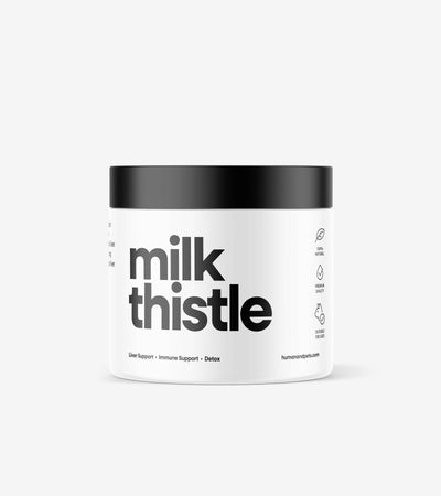 Milk thistle powder container with dried milk thistle seeds for liver support and antioxidant benefits